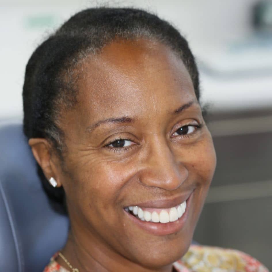 patient face picture after implant treatment in dentist leicester